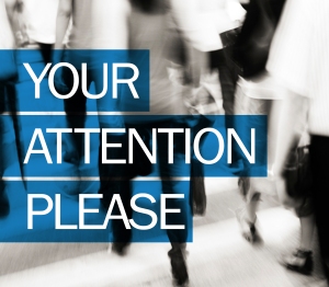 your attention please